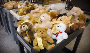 Oakwood High School students & Lasertoma group give stuffed teddy bears to patients at Ohio's Hospice of Dayton Hospice House.