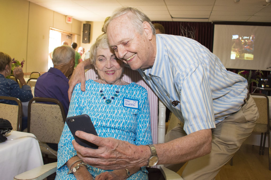 Mary gets a selfie with her partner Charlie at her Big A-Wake.